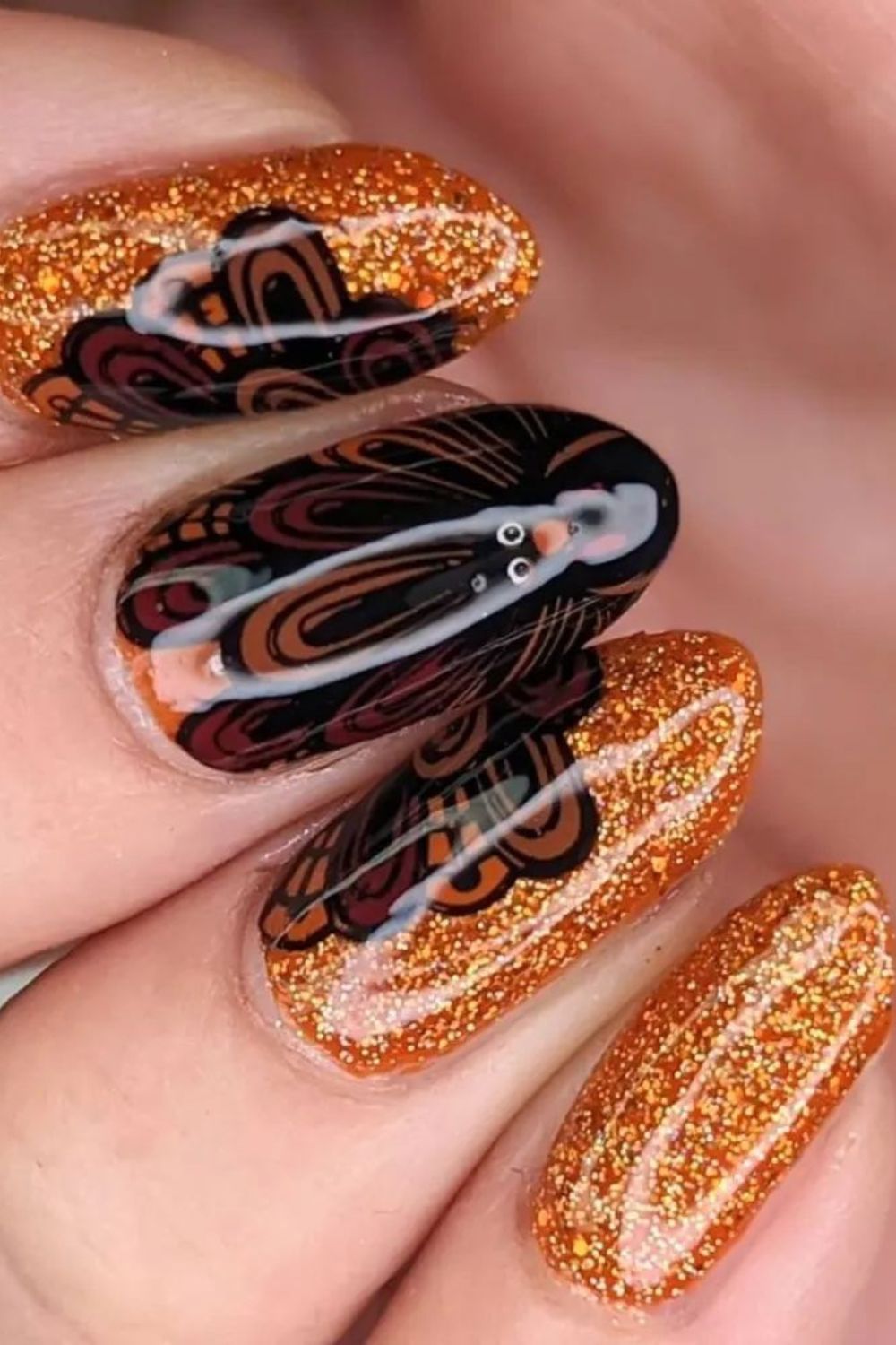 Orange Glitter and Black Feathered Art