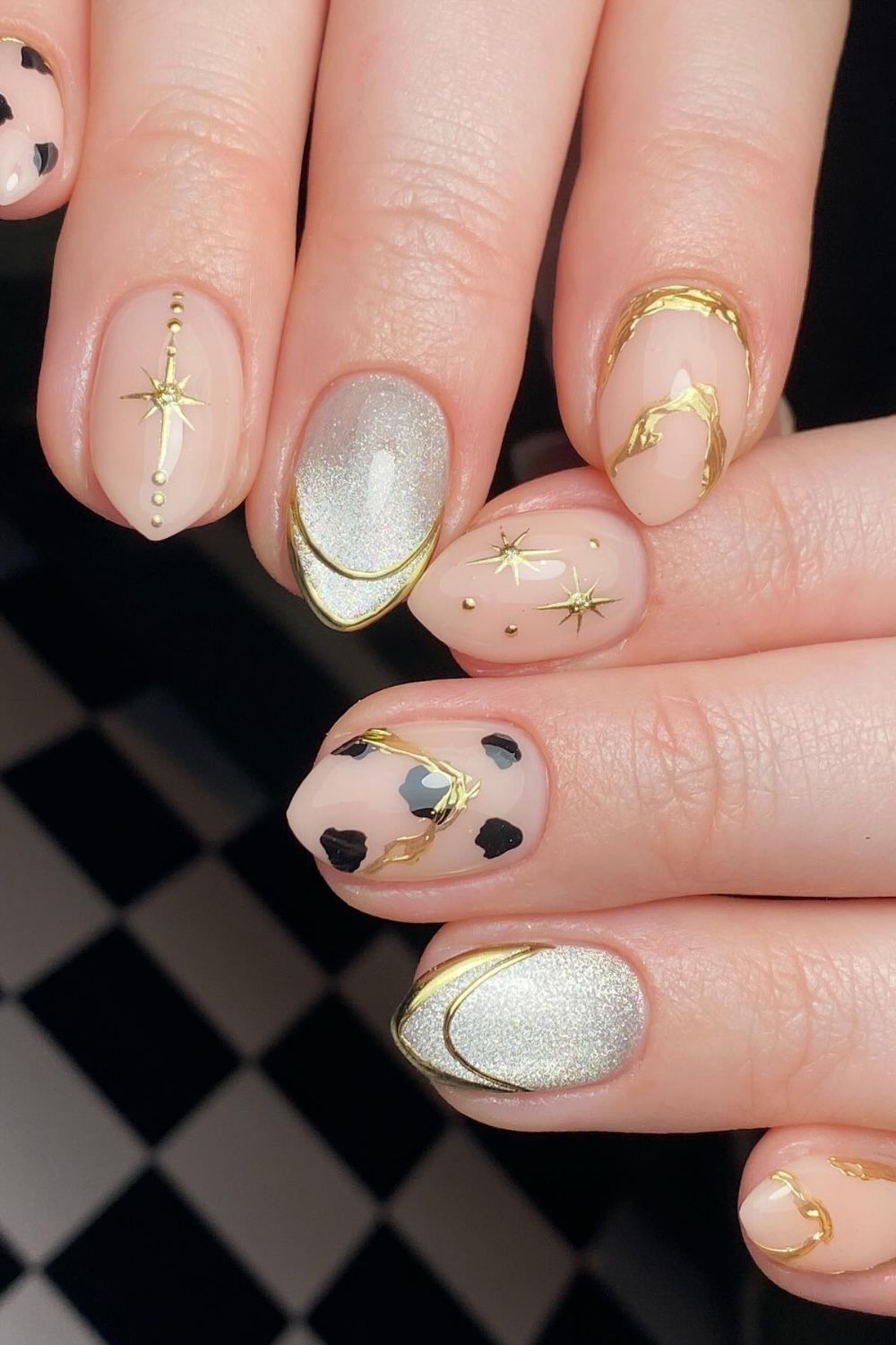 White And Gold Celestial Nails